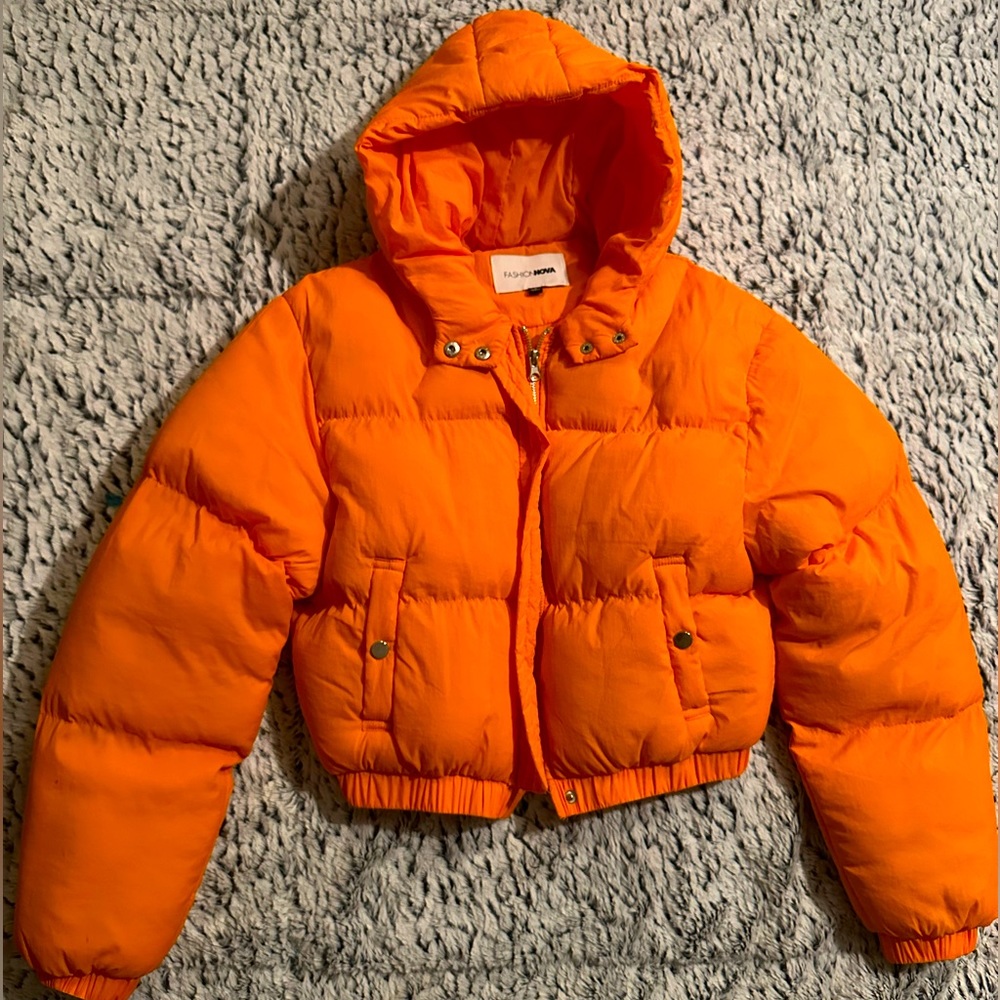 Puffer jacket will keep you warm at all times. Slightly cropped with two pockets